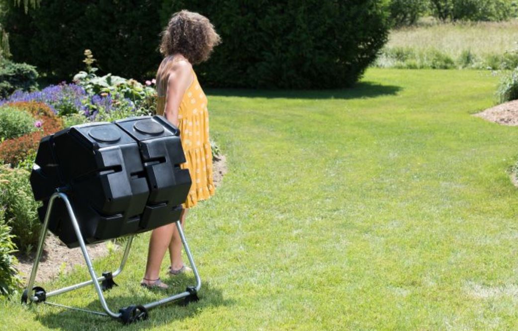 tumbling composter with wheels makes it easy to move around the garden 